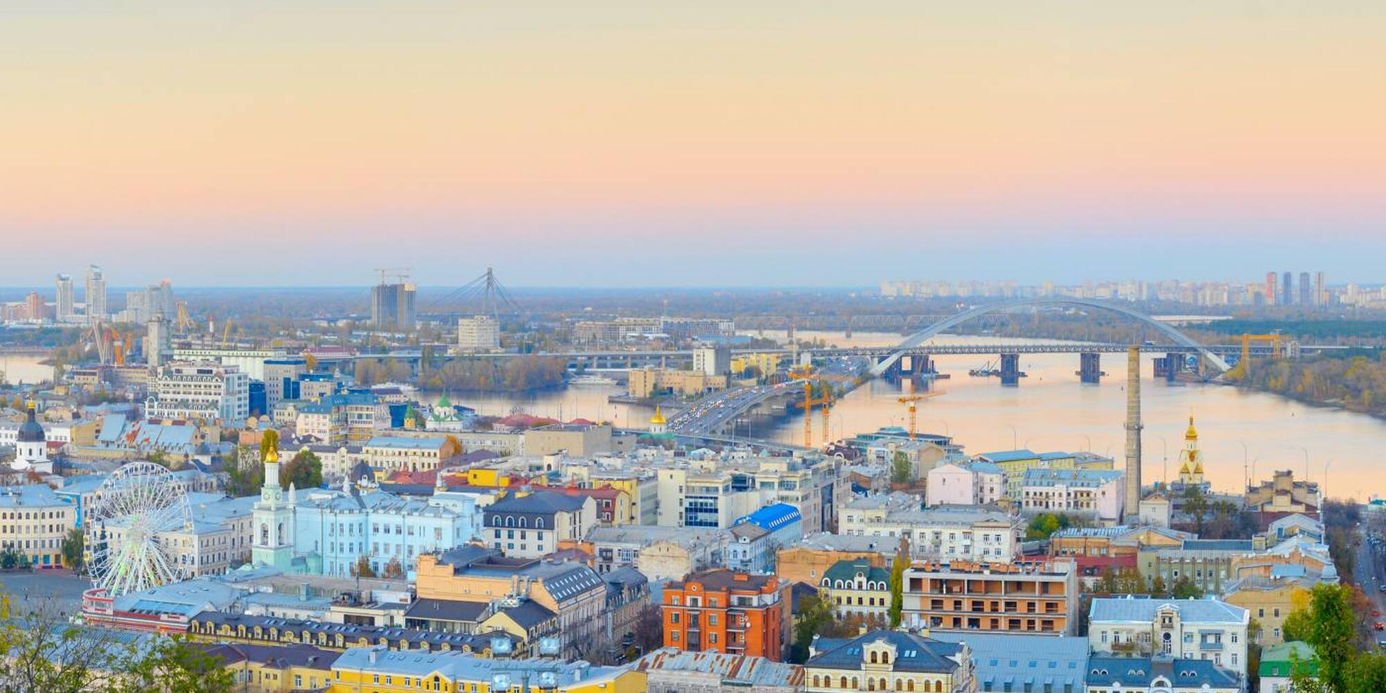 Sunset view of Podil - historical district on the bank of Dnipro river. Kyiv, Ukraine
